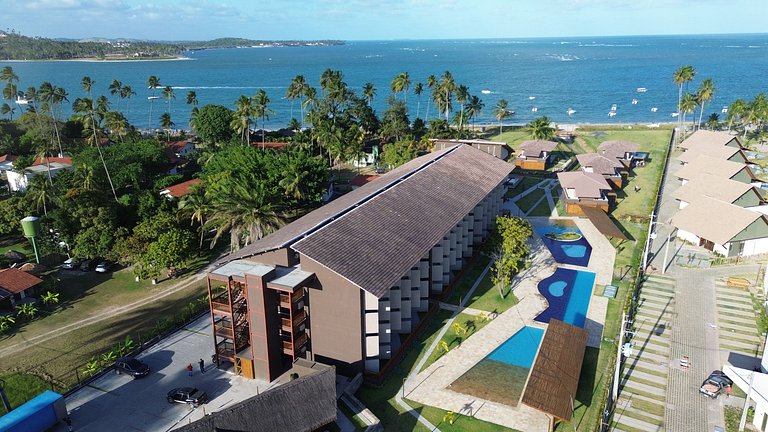 Pé na areia | Studio Moderno com Varanda (D129)